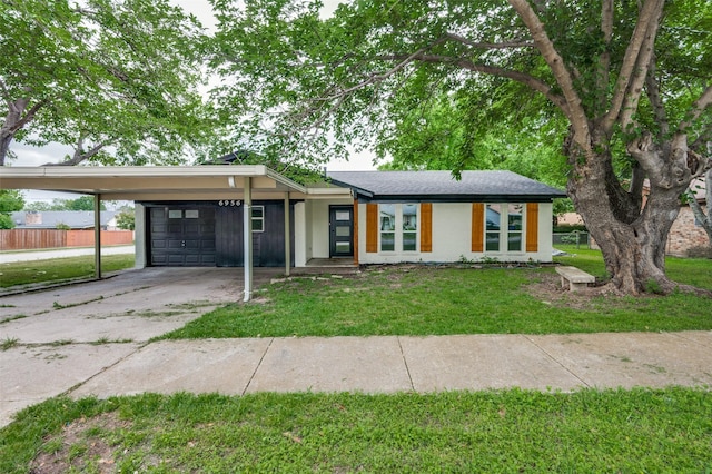 ranch-style house with a front lawn and a carport