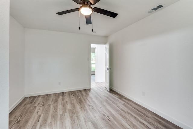 unfurnished room featuring ceiling fan and light hardwood / wood-style flooring