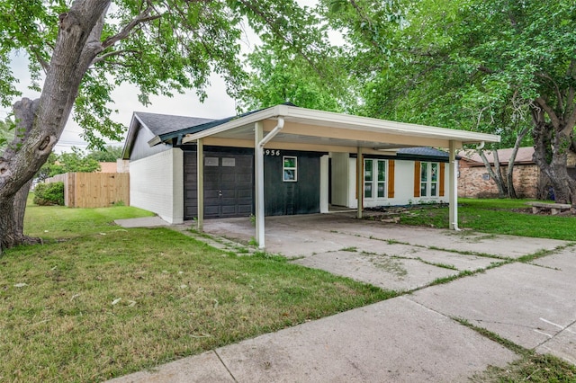 single story home featuring a carport and a front lawn