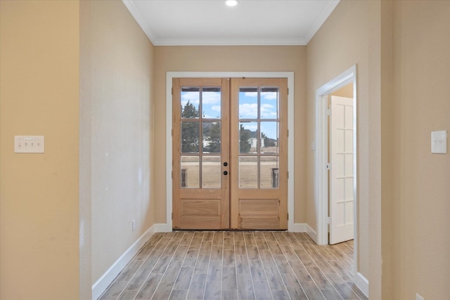 doorway to outside with french doors, recessed lighting, baseboards, ornamental molding, and light wood finished floors