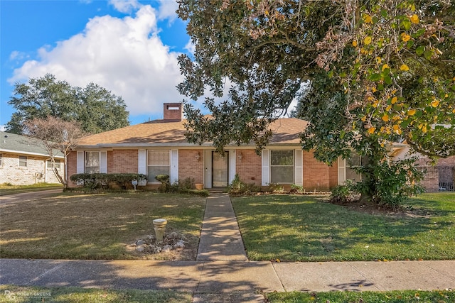 view of front of home with a front yard