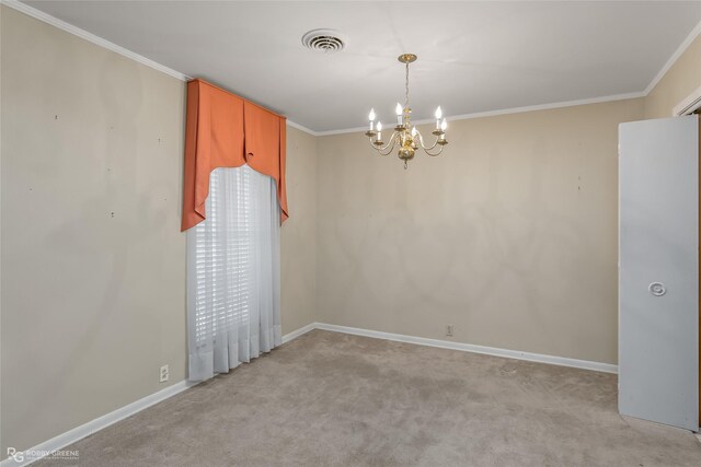 spare room featuring a notable chandelier, ornamental molding, and light carpet