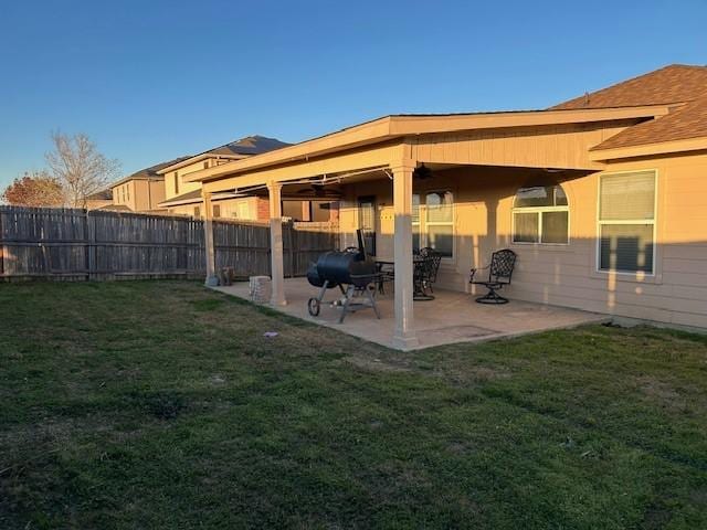 view of yard featuring a patio and fence