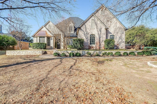 view of front of house with a front lawn