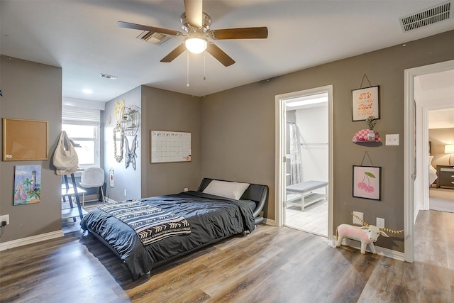 bedroom featuring hardwood / wood-style floors and ceiling fan