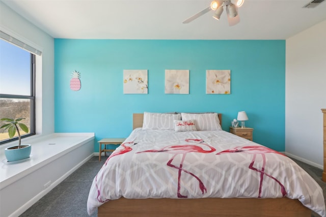 carpeted bedroom featuring ceiling fan