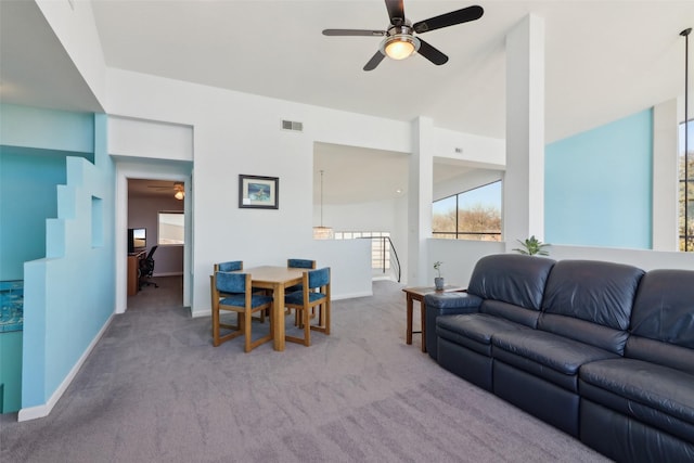 living room with light colored carpet