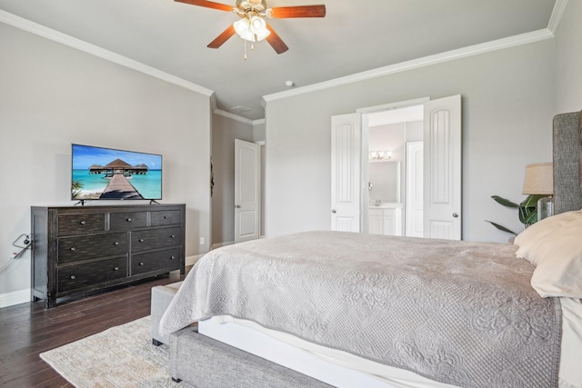 bedroom with ceiling fan, dark hardwood / wood-style floors, crown molding, and ensuite bath