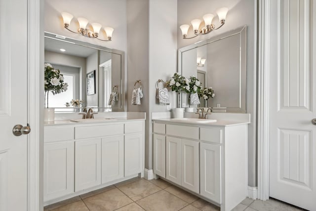 bathroom featuring tile patterned floors and vanity