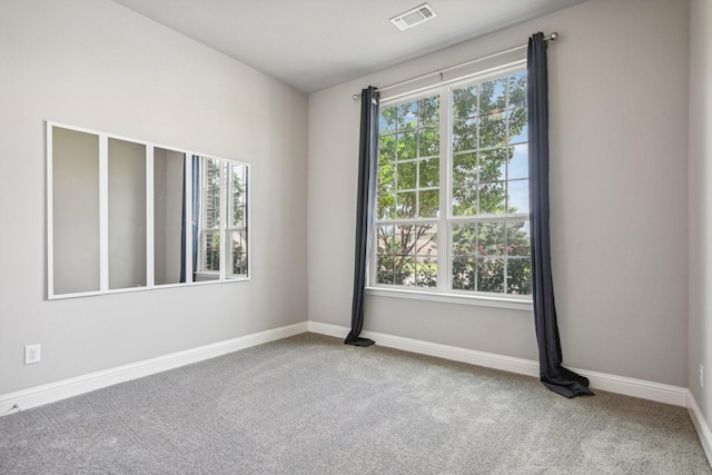 view of carpeted spare room