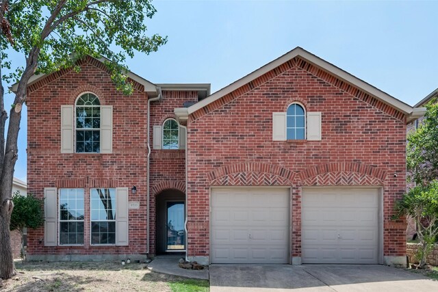 front of property featuring a garage