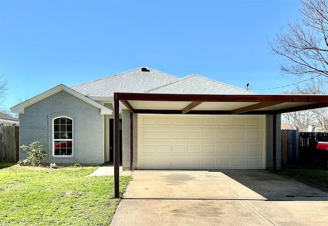 ranch-style home featuring a front lawn, a carport, and a garage