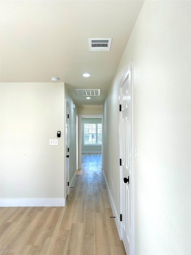 hall featuring light hardwood / wood-style flooring