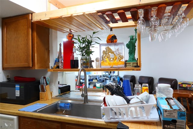 kitchen with dishwasher and sink