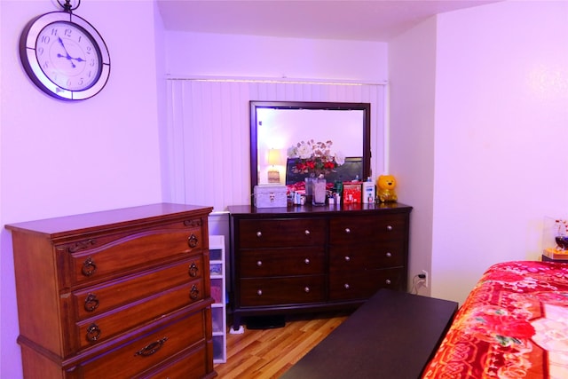 bedroom with light wood-type flooring