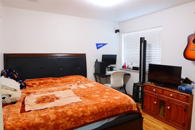 bedroom featuring light wood-type flooring