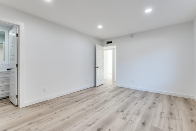 empty room featuring light hardwood / wood-style floors