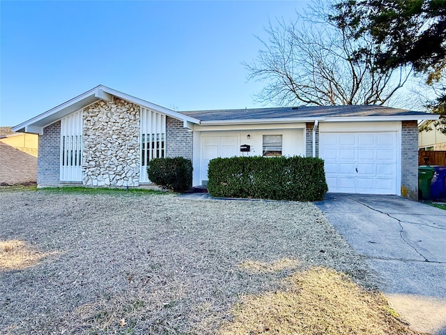 single story home featuring a garage