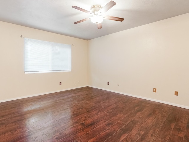 unfurnished room featuring dark hardwood / wood-style floors and ceiling fan