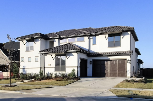 view of front of home with a garage