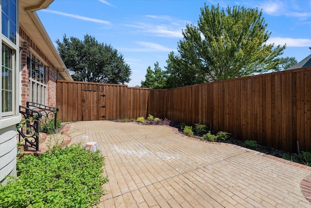 view of patio / terrace featuring a fenced backyard