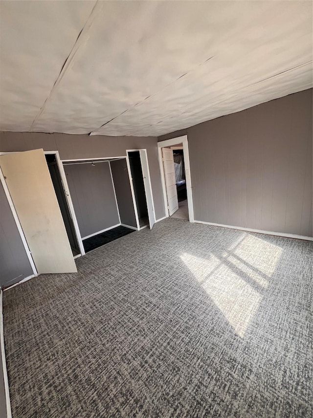 unfurnished bedroom with carpet floors