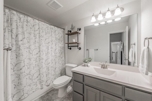 full bathroom featuring shower / bath combo with shower curtain, vanity, and toilet