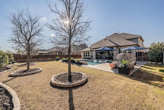 view of yard featuring a gazebo, a patio, and a fenced in pool