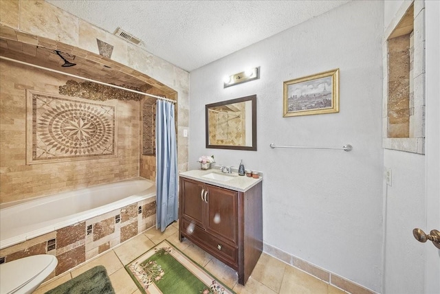 full bathroom featuring shower / bath combo, vanity, a textured ceiling, tile patterned flooring, and toilet