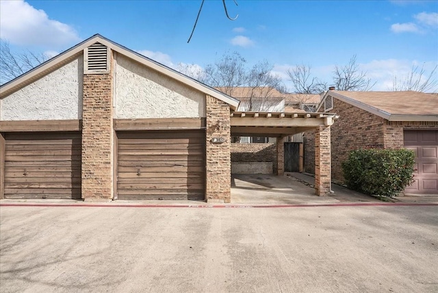 exterior space featuring a carport