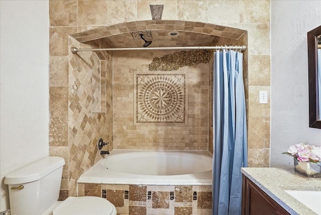 full bathroom featuring shower / bath combo, vanity, and toilet