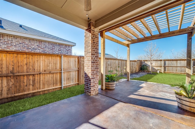 view of patio with ceiling fan and a pergola