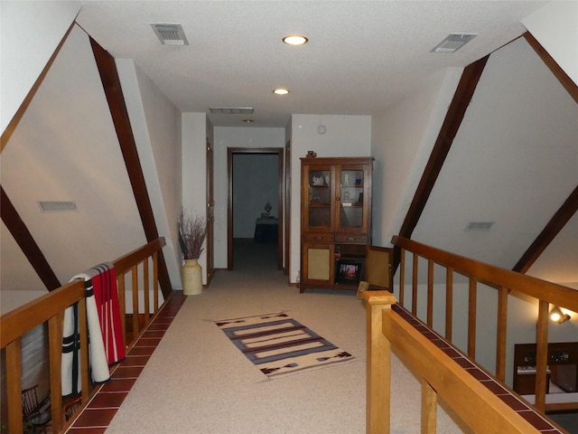 hall with visible vents and recessed lighting