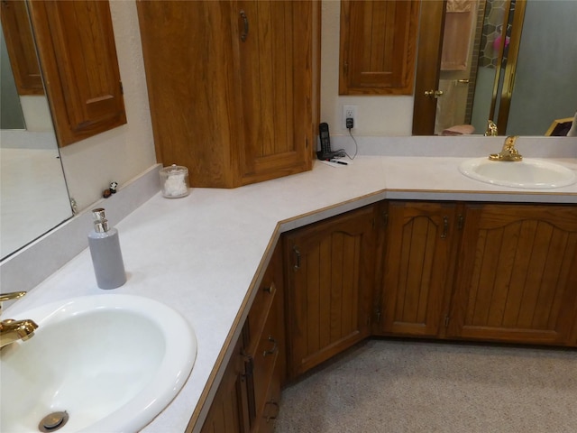 full bath with a shower with door and vanity