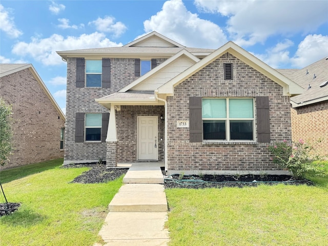 view of front facade with a front lawn