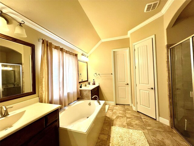 bathroom featuring plus walk in shower, tile patterned floors, vaulted ceiling, vanity, and ornamental molding