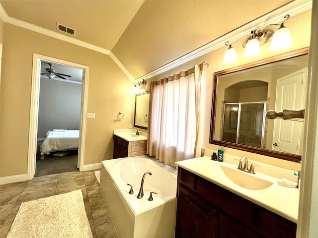 bathroom featuring vanity, vaulted ceiling, ceiling fan, crown molding, and independent shower and bath