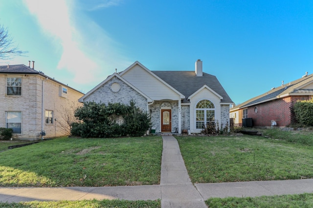 view of front of property with a front lawn