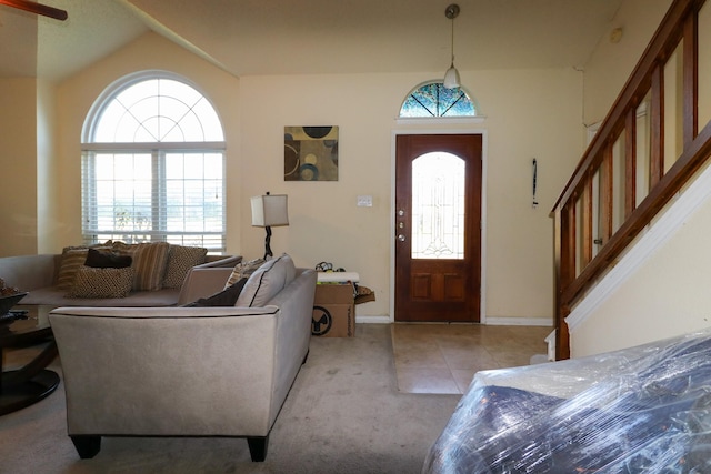 view of carpeted foyer