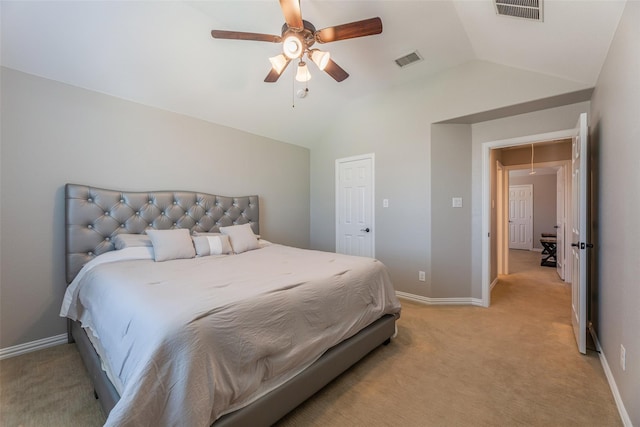 bedroom with lofted ceiling, light carpet, and ceiling fan