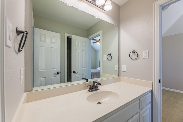 bathroom featuring vanity and ceiling fan