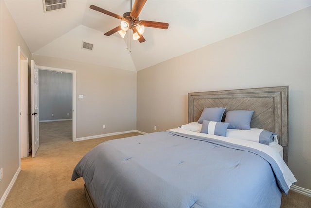 bedroom with ceiling fan, lofted ceiling, and light carpet