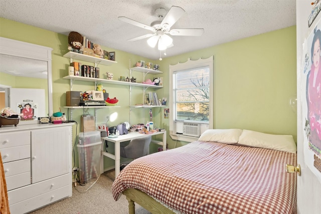 bedroom with ceiling fan, light carpet, a textured ceiling, and cooling unit