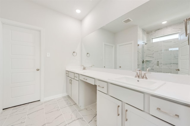 bathroom with vanity and an enclosed shower