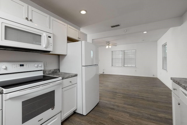 kitchen featuring white appliances, white cabinetry, ceiling fan, and dark wood-type flooring