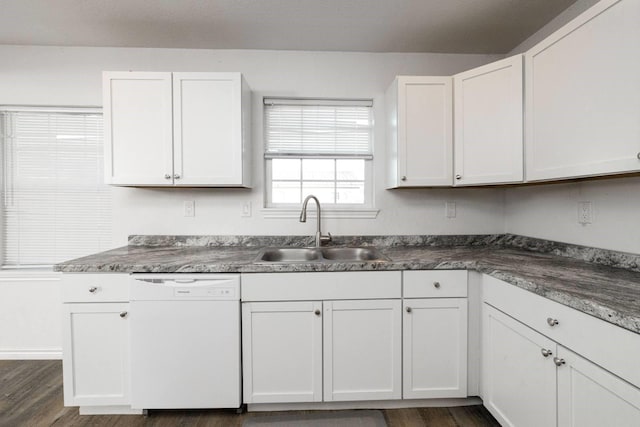 kitchen with white cabinets, sink, white dishwasher, and dark wood-type flooring