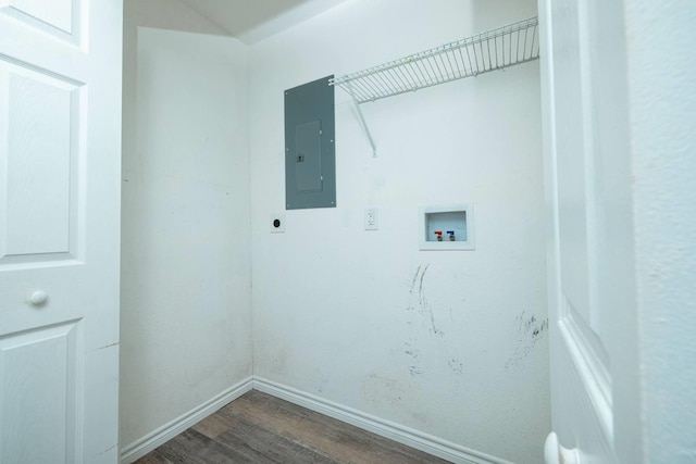 washroom with hookup for an electric dryer, washer hookup, electric panel, and wood-type flooring