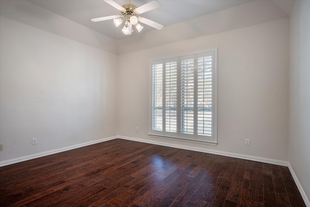 unfurnished room featuring ceiling fan and dark hardwood / wood-style floors