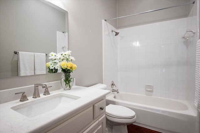 full bathroom with toilet, vanity, wood-type flooring, and shower / bath combination