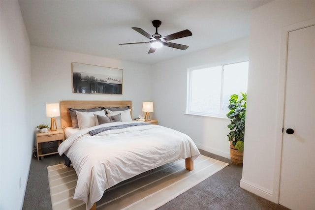 carpeted bedroom with ceiling fan